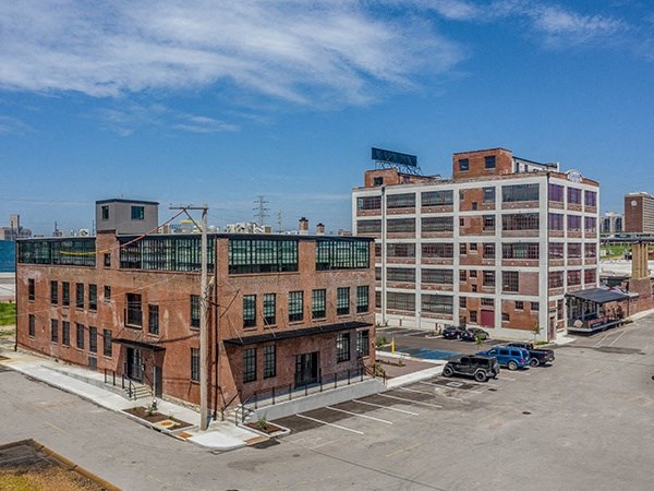 Steelcote Crossing exterior historic brick building with Steelcote Lofts in the background  at Steelcote Square, St. Louis, 63103