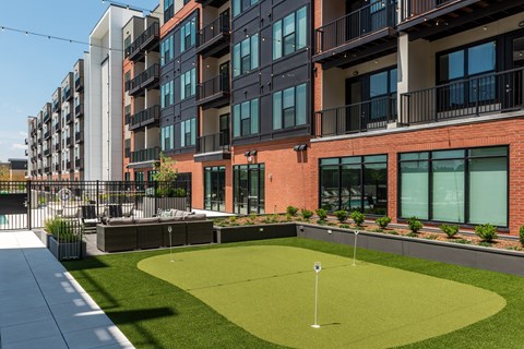 Resident courtyard with putting green  at Chapter at the Streets of St Charles, Saint Charles, 63303