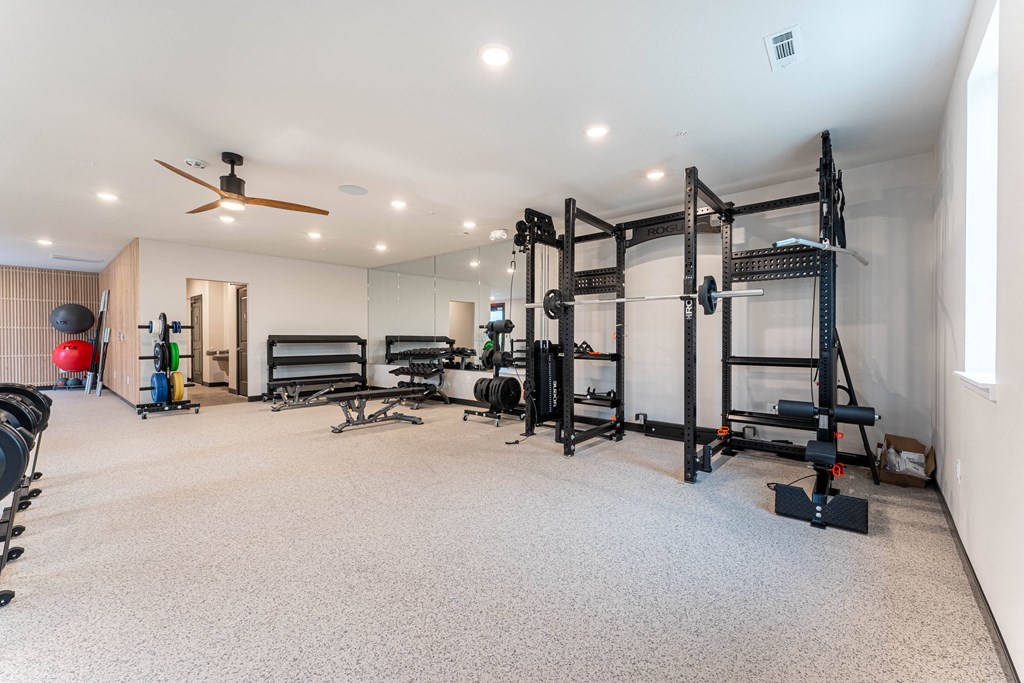 fitness center with strength training and free weights at Pure Lowell, Lowell, 72745