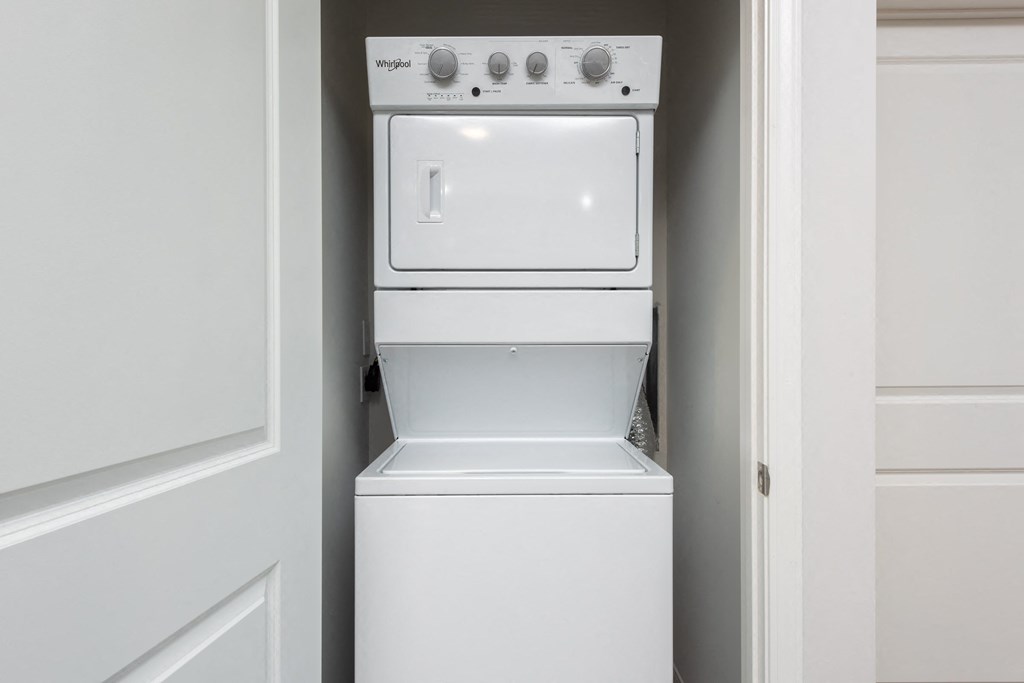 Full-size stackable washer and dryer in unit  at Chapter at the Streets of St Charles, Saint Charles, Missouri