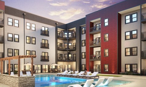 A modern apartment complex with a pool in the foreground.