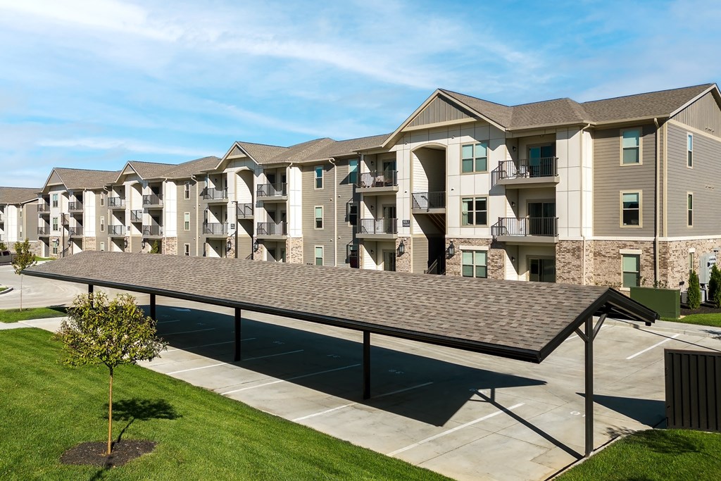 an overhead view of an apartment building with a parking lot at The Station St. Peters, St. Peters Missouri