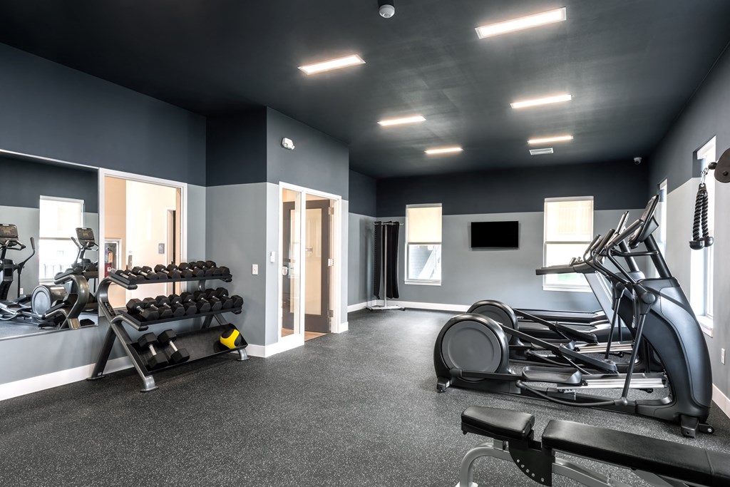 the gym at the flats at big tex apartments at The Station St. Peters, St. Peters
