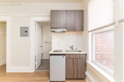 A kitchen with a dishwasher and a sink.