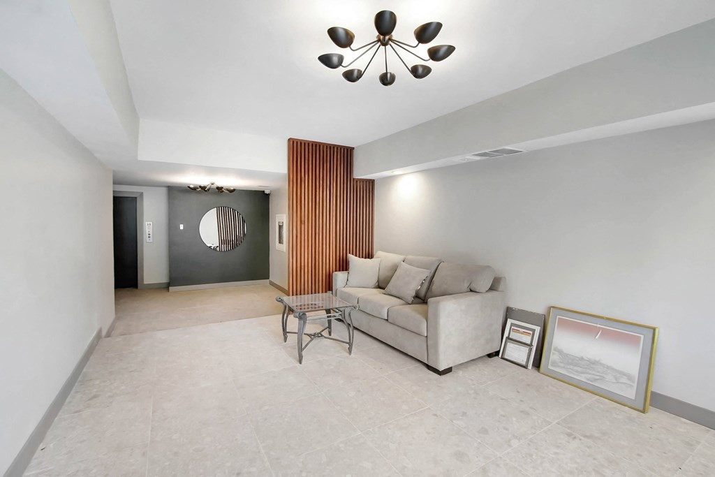 a living room with a couch and a table