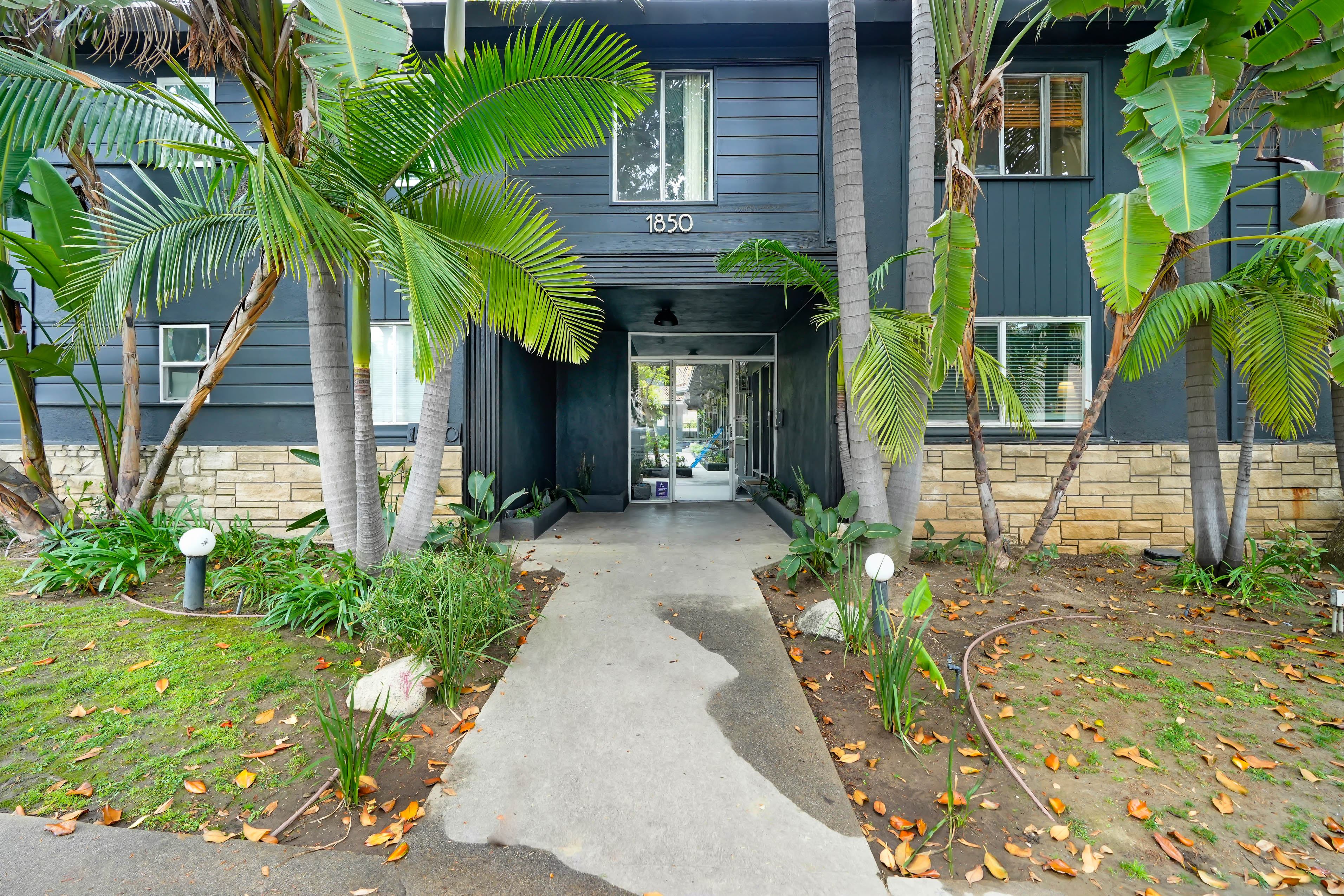 A house numbered 1830 is shown with a pathway leading to the front door.