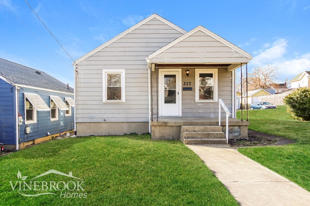 A small house with the number 217 on the door.