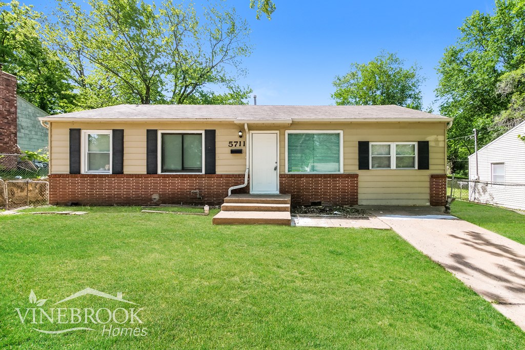 A house with a Vinebrook Homes logo in the corner.