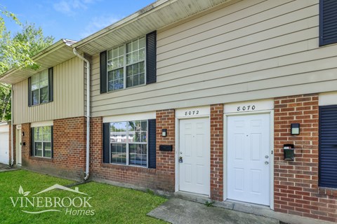 A house with the number 8070 on the front door.