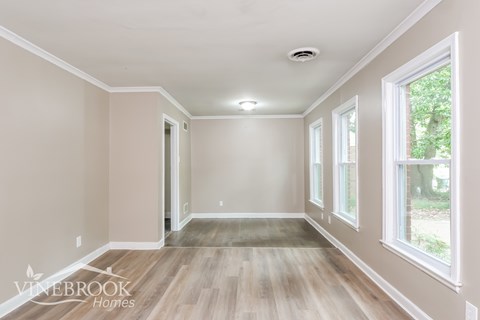A room with a Vinebrook Homes logo on the bottom left corner.