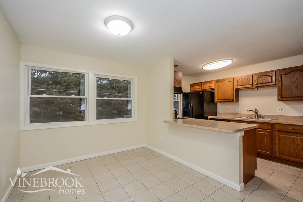 a kitchen with a counter top and a sink