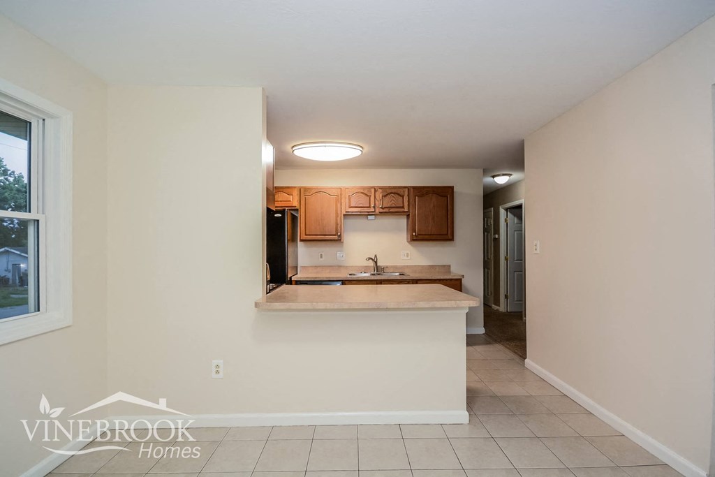 a kitchen with a counter top and a sink