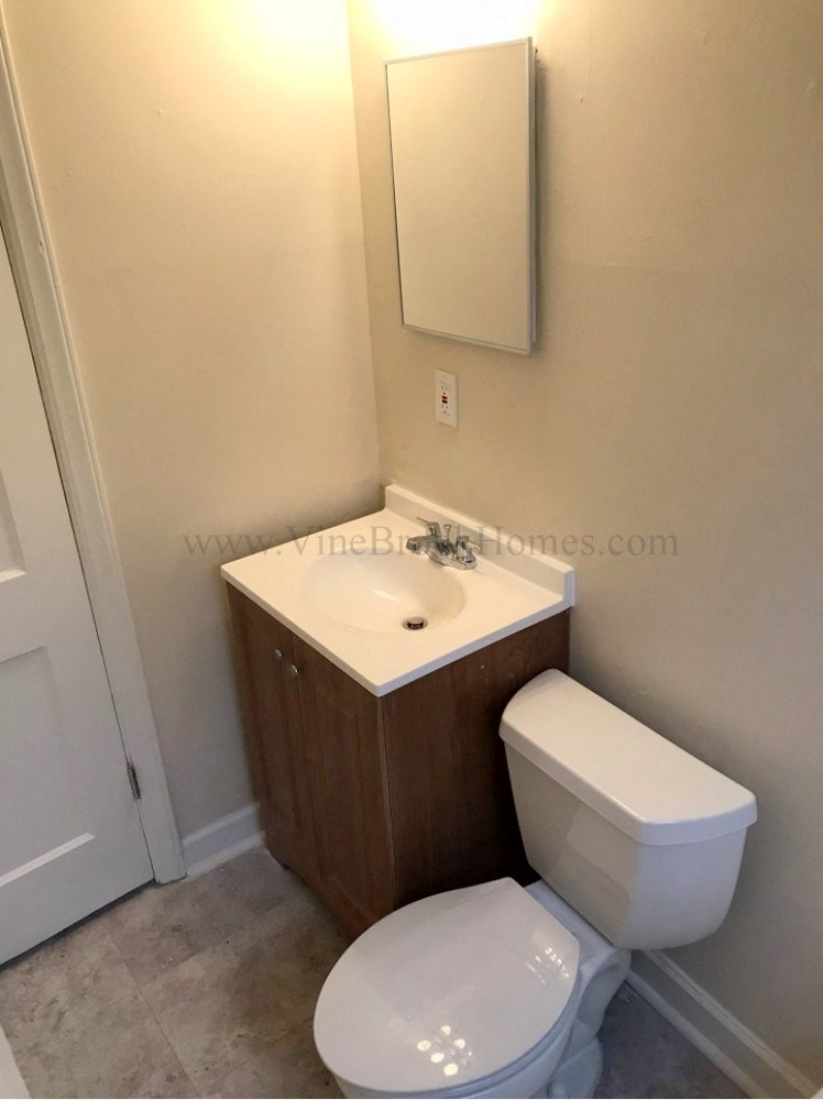 a small bathroom with a toilet and a sink