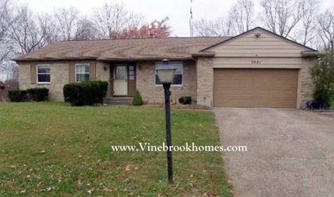 a house with a street light in front of it