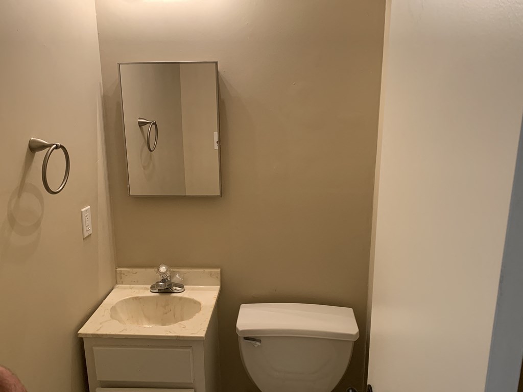 a small bathroom with a toilet and a sink