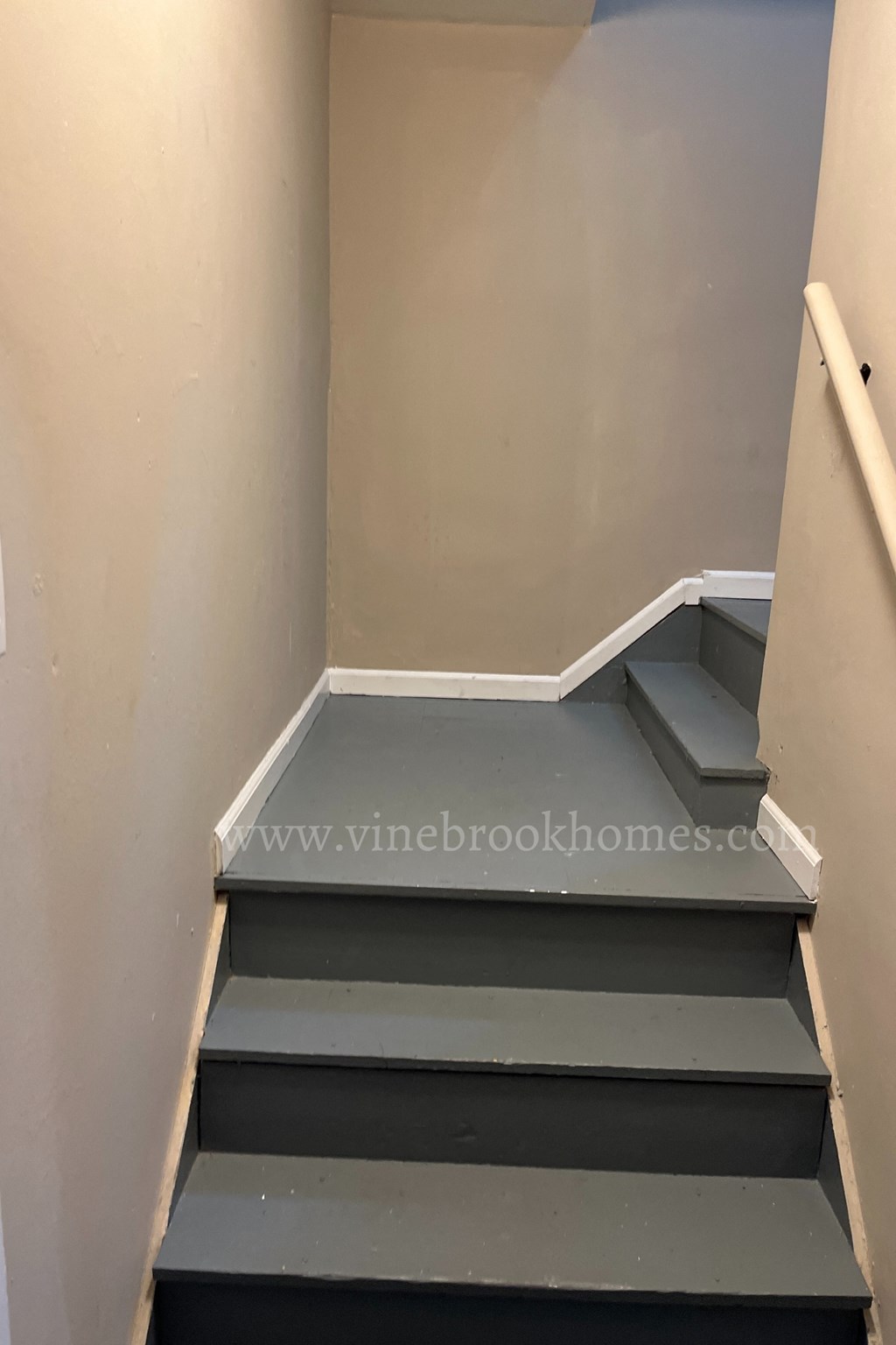 the stairwell has been painted and is ready to go down the stairs
