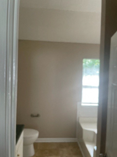 a small bathroom with a toilet and a sink