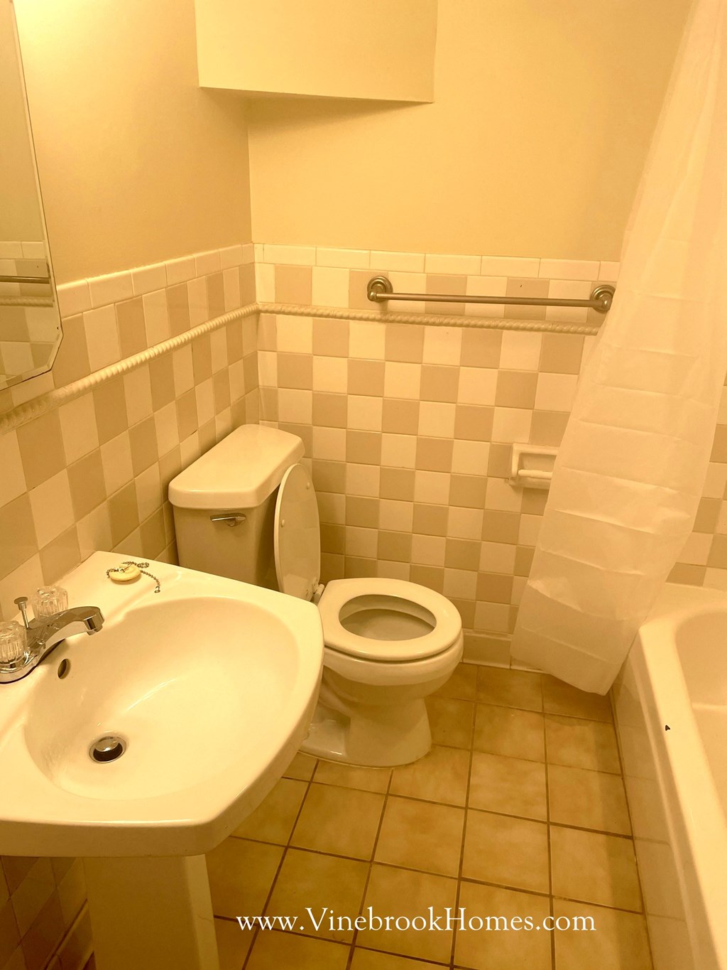a small bathroom with a toilet and a sink