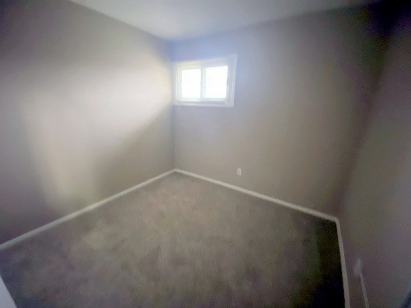 a empty room with a window in it