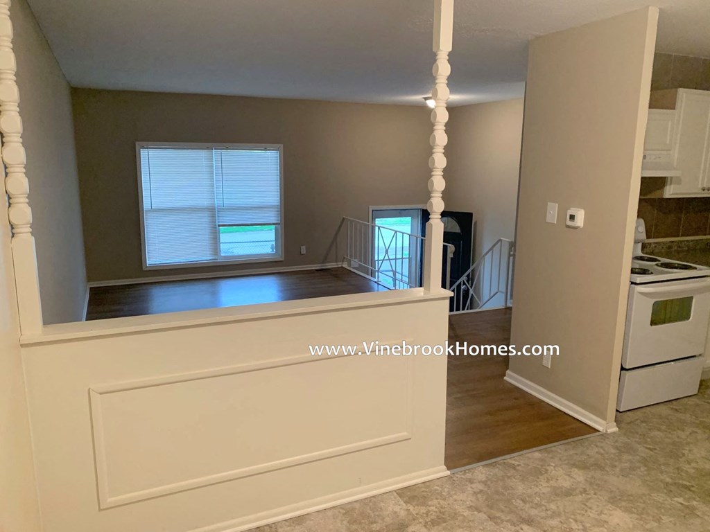 a kitchen with a counter and a window