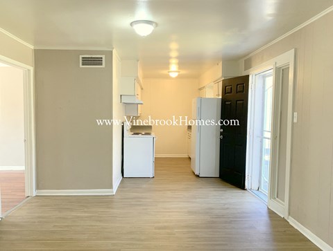 a separate living room and kitchen are available in the second floor apartment