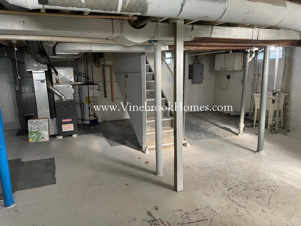 a set of stairs in the basement of a building