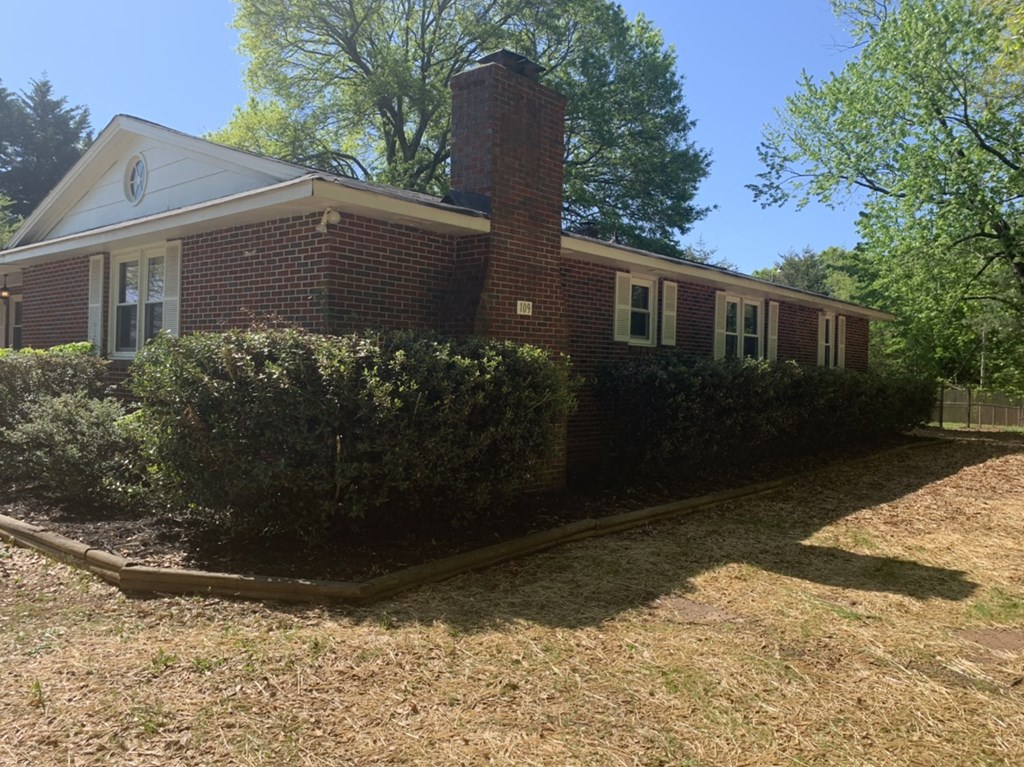 a view of the front of a brick house
