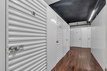 A storage unit with the number 32 on the door.