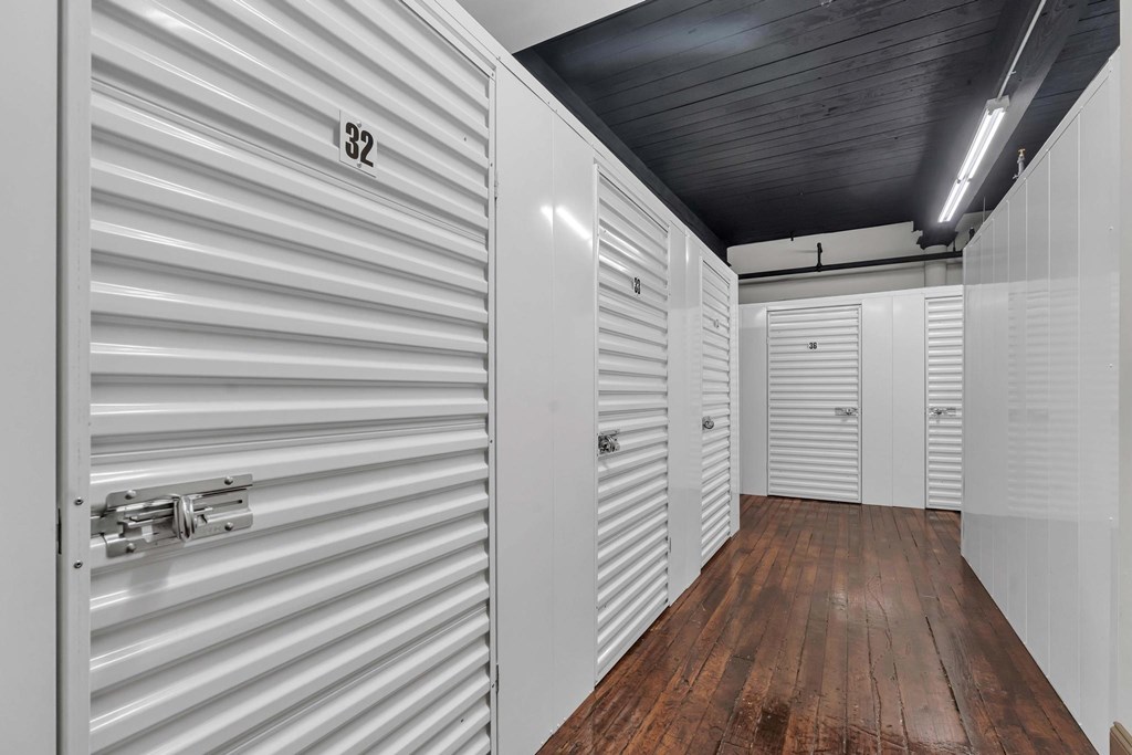 A storage unit with the number 32 on the door.