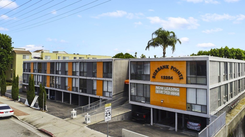 A building with a sign that says "DANK CONTROL" on it.