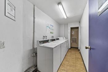 A laundry room with a washer and dryer.