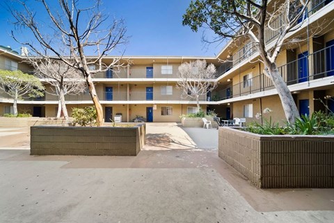 A sunny day at the courtyard of a residential building.
