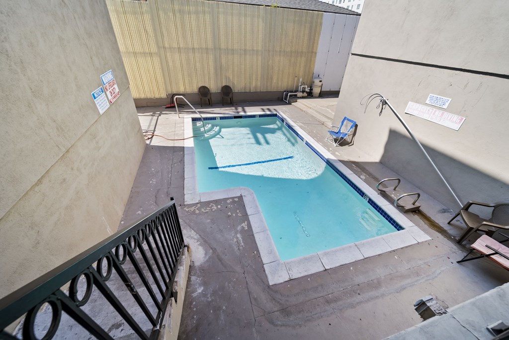 A small pool with a blue tinted water.