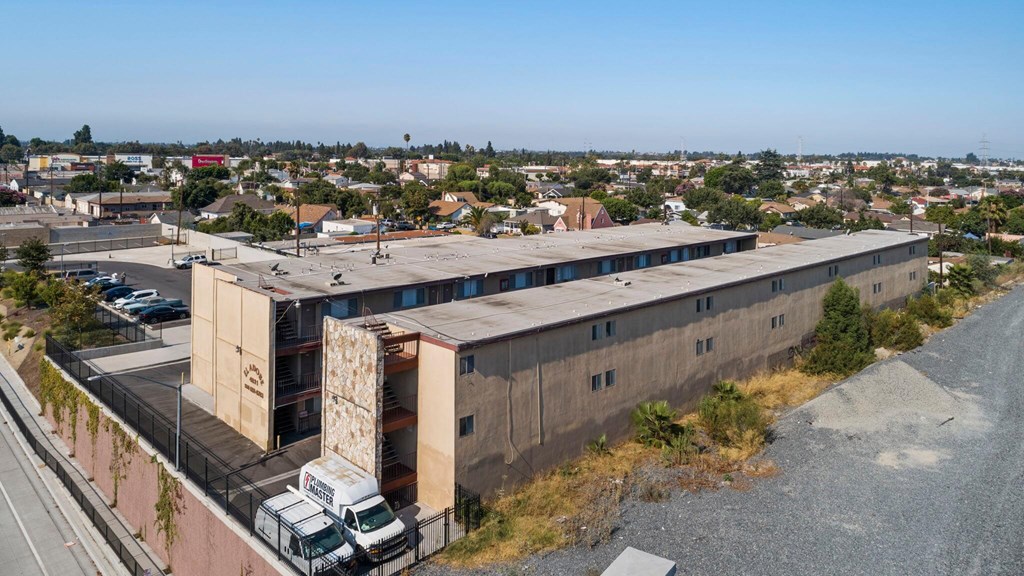 A large building with a truck parked in front of it.