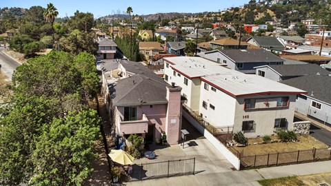 A residential area with houses and trees.