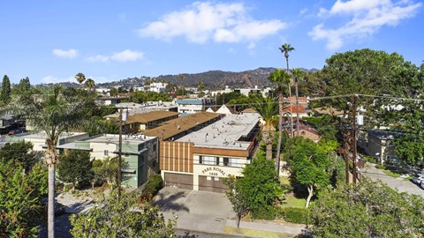 A view of a building with a sign that reads "BAR".