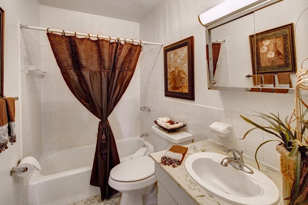 Classic bathroom with tile at Kings Gate West Apartments, New York, 13031