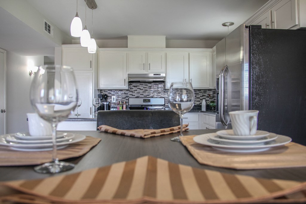 kitchen with white cabinets and stainless steel appliances at Village of Cottonwood Springs, El Paso TX