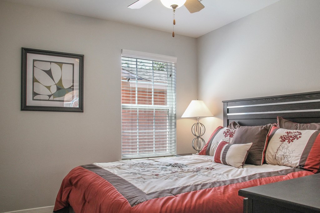 bedroom with a bed and a window view at The Village at Cottonwood Springs, El Paso, TX 