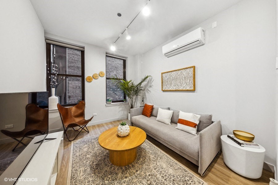 a living room with a couch and a coffee table