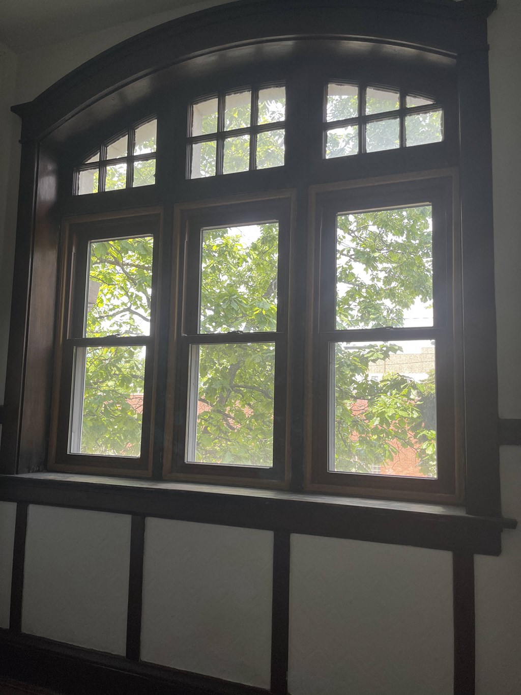 the view of a window from the inside of a house