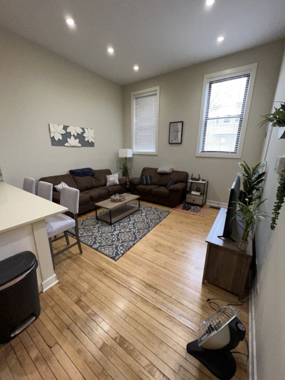 a living room with a couch and a table