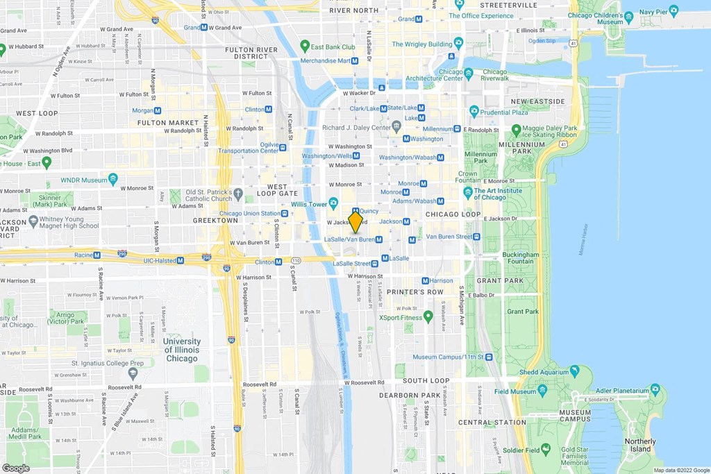 a map of a city with a yellow arrow points to a location on the map