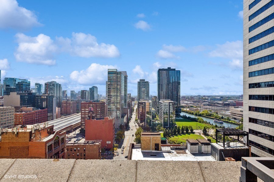 a view of the city from the roof of a building