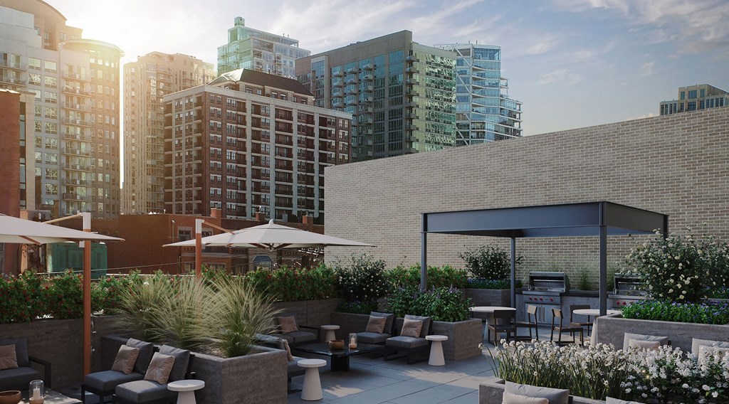 a view of the rooftop patio at the hugo apartments chicago