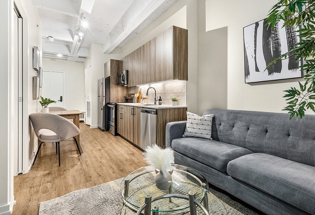 a living room with a couch and a table