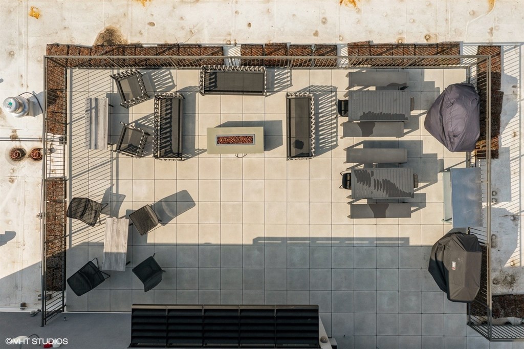 A top-down view of a room with a variety of furniture and equipment.