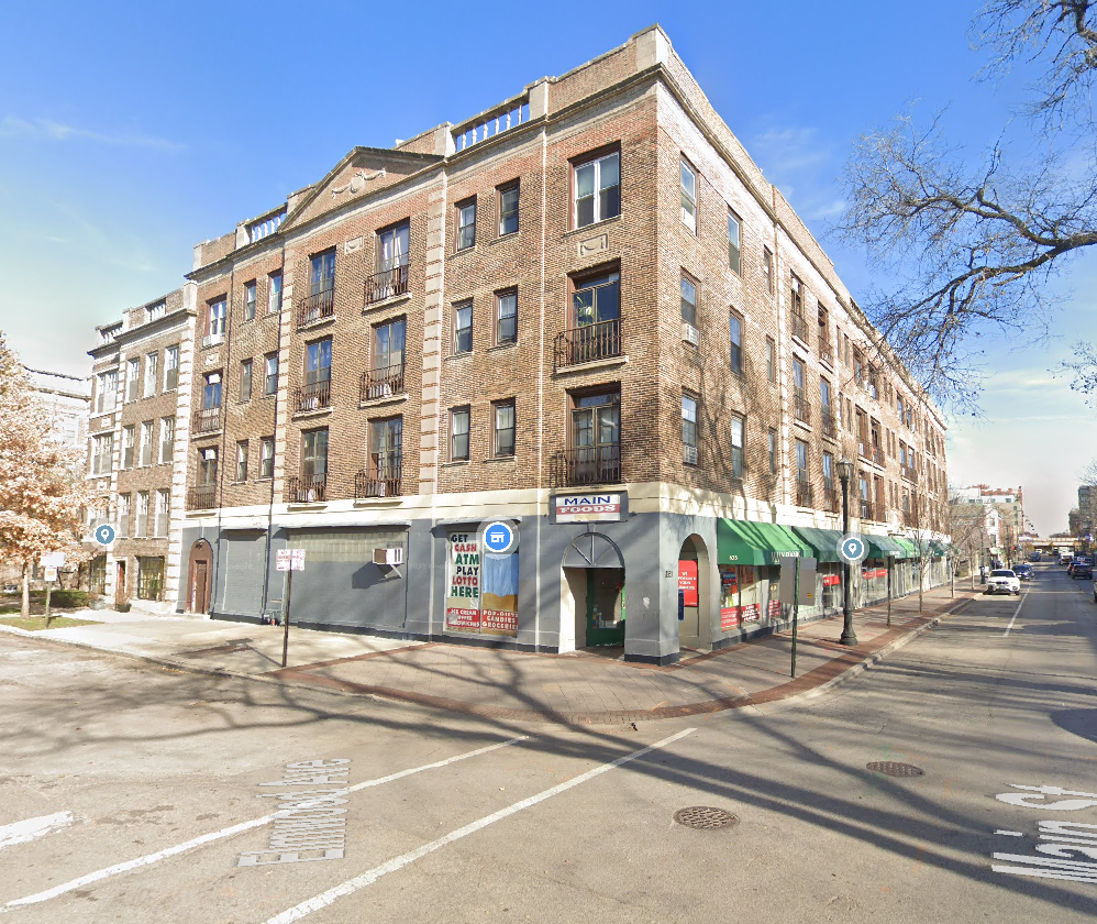a building on the corner of a city street