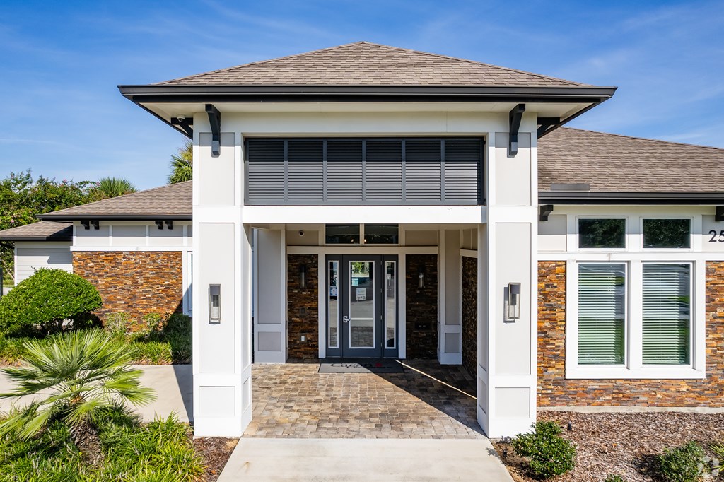 A house with a front porch and a covered entrance.