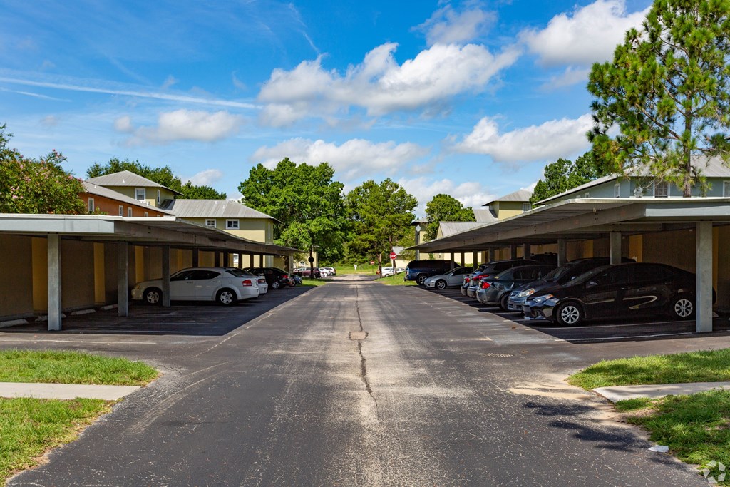 A parking lot with cars parked in it.